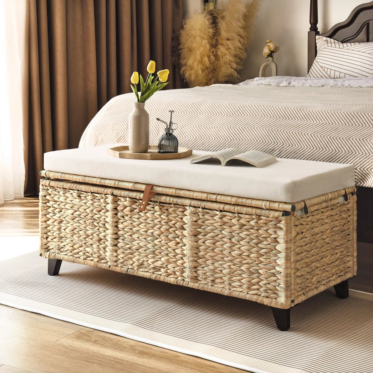 Brown flip-top wicker storage bench used as a coffee table in a cozy living room setting - WELL ZONE