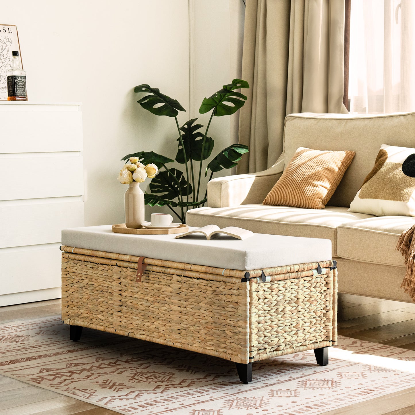 Brown flip-top wicker storage bench used as a coffee table in a cozy living room setting - WELL ZONE